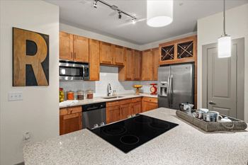Modern kitchen with black stove top